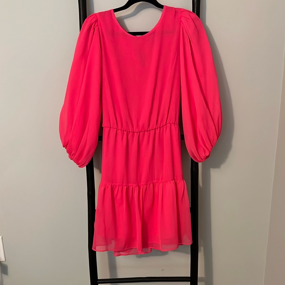 Women’s hot pink dress.